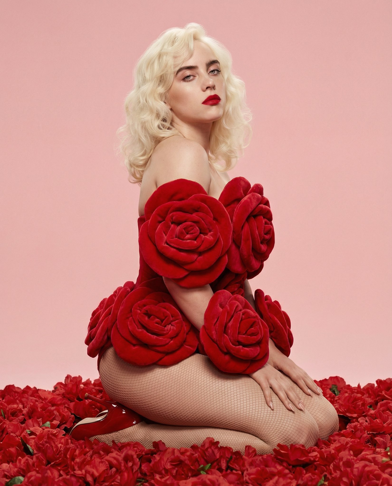 Billie Eilish Amidst Crimson Roses