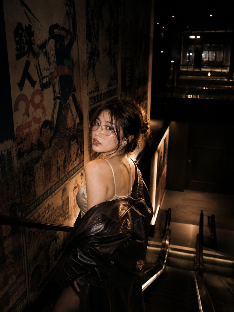 Cinematic nighttime portrait of a stylish young Asian wom... thumbnail 2