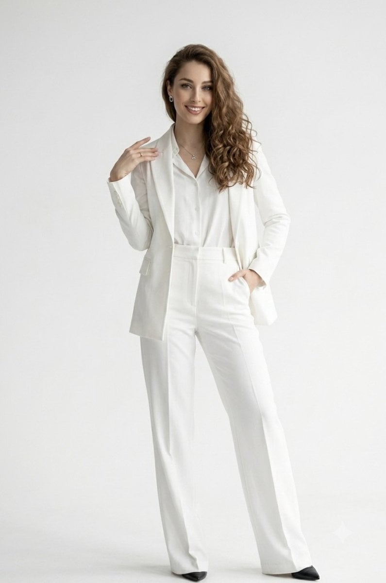 A full-length studio portrait of a confident, smiling wom... thumbnail 4