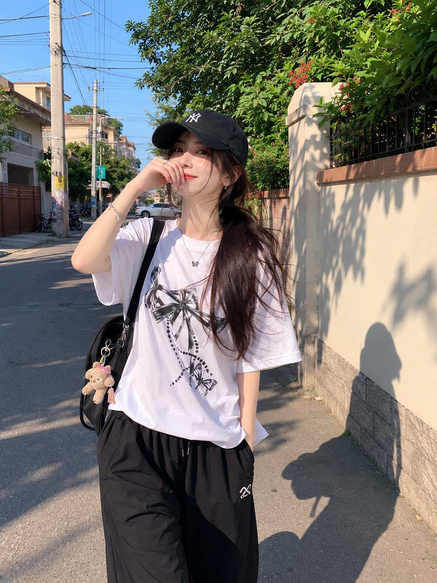 Candid Japanese Girl in Alley Sunlight image 1