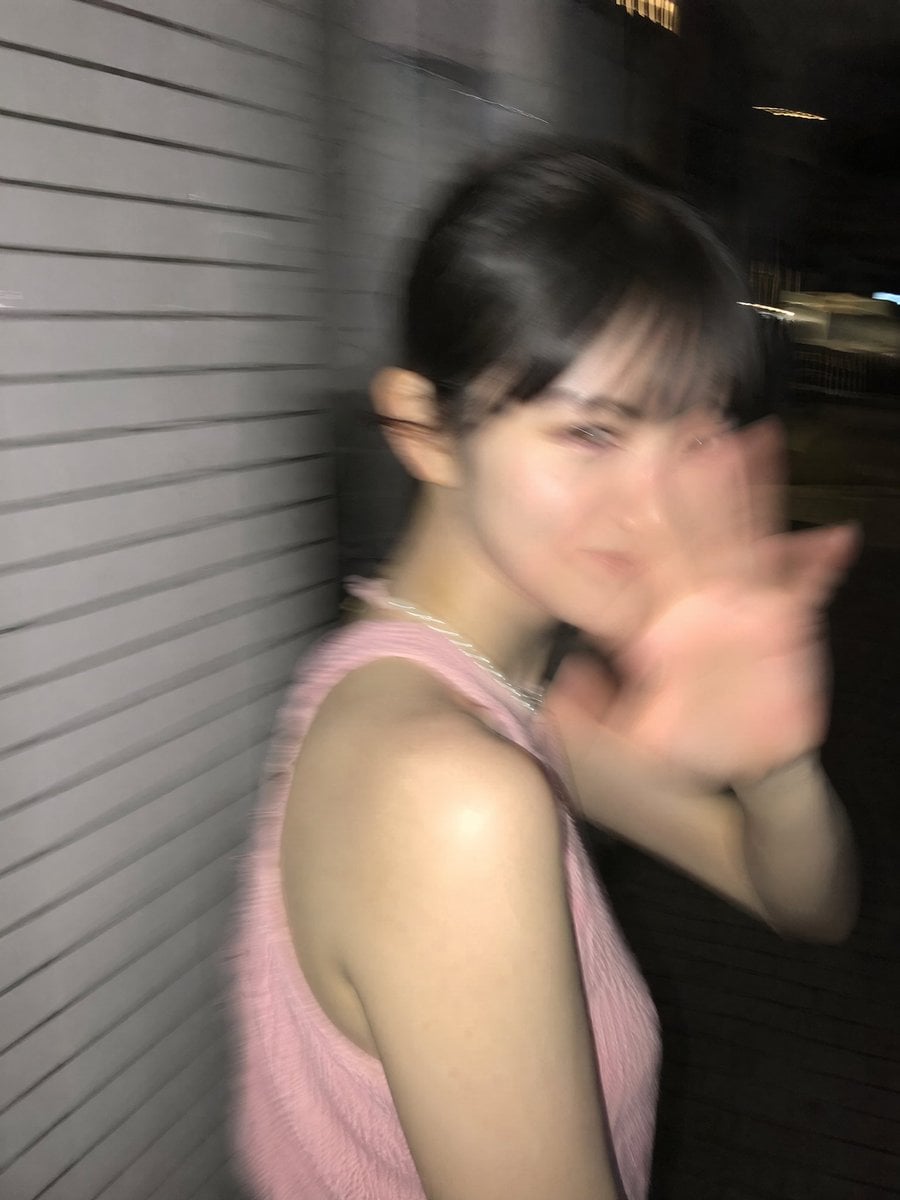 Candid Nighttime Tokyo Snapshot of Surprised Woman thumbnail 2